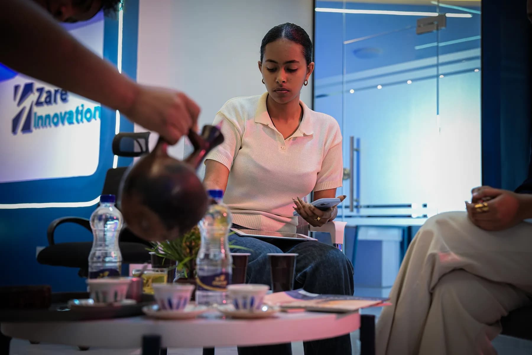 Coffee poured from a jebena during an Ethiopian coffee ceremony at the Zare office